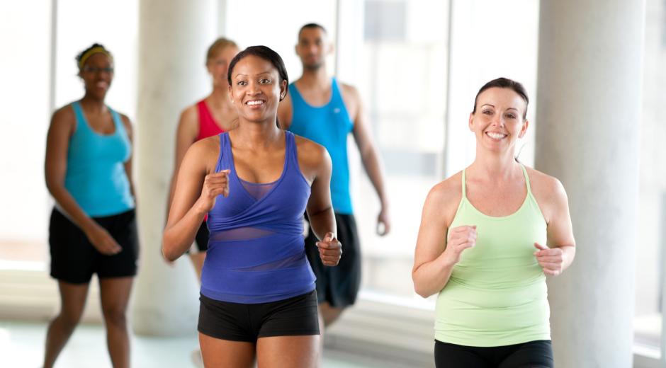 Members at 10GYM Broken Arrow, Oklahoma, walking on the indoor track for health and fitness