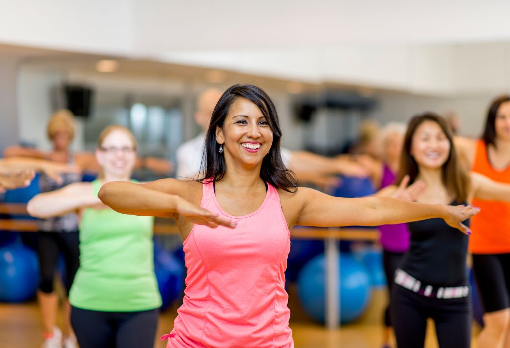 10GYM Broken Arrow members enjoying a high-energy Zumba group fitness class for cardio and fun