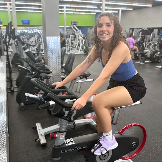 Stationary bike cardio at 10GYM Edmond OK for low-impact endurance training