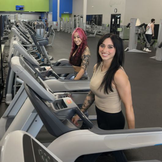 gym members during a High-energy cardio session at 10GYM North OKC OK for a low-impact, intense workout