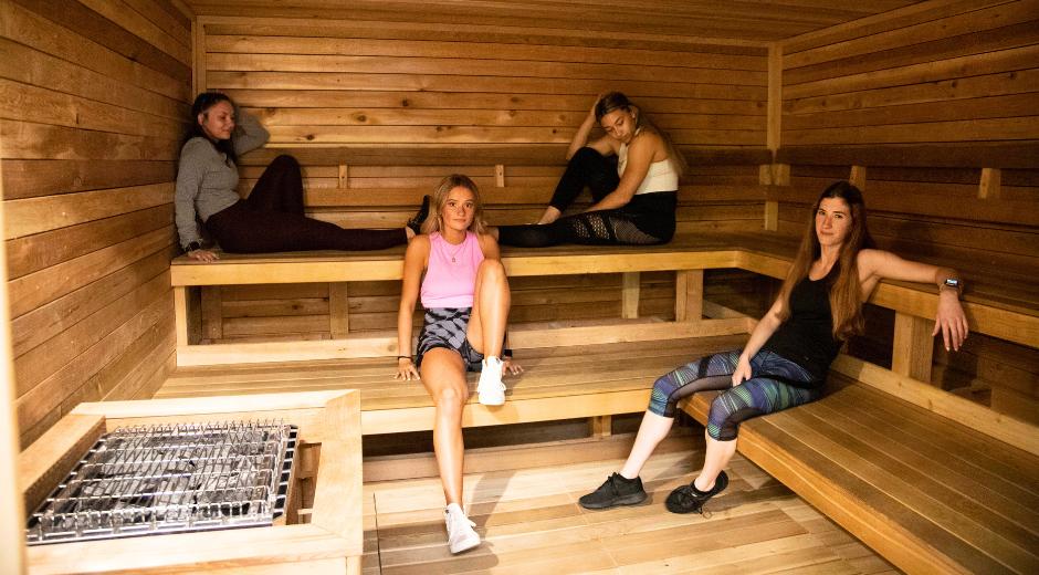 members enjoying post-workout recovery in the 10gym owasso sauna near me