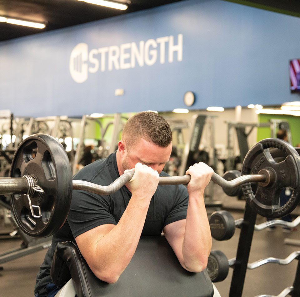 Man lifting weights at south oklahoma city gym