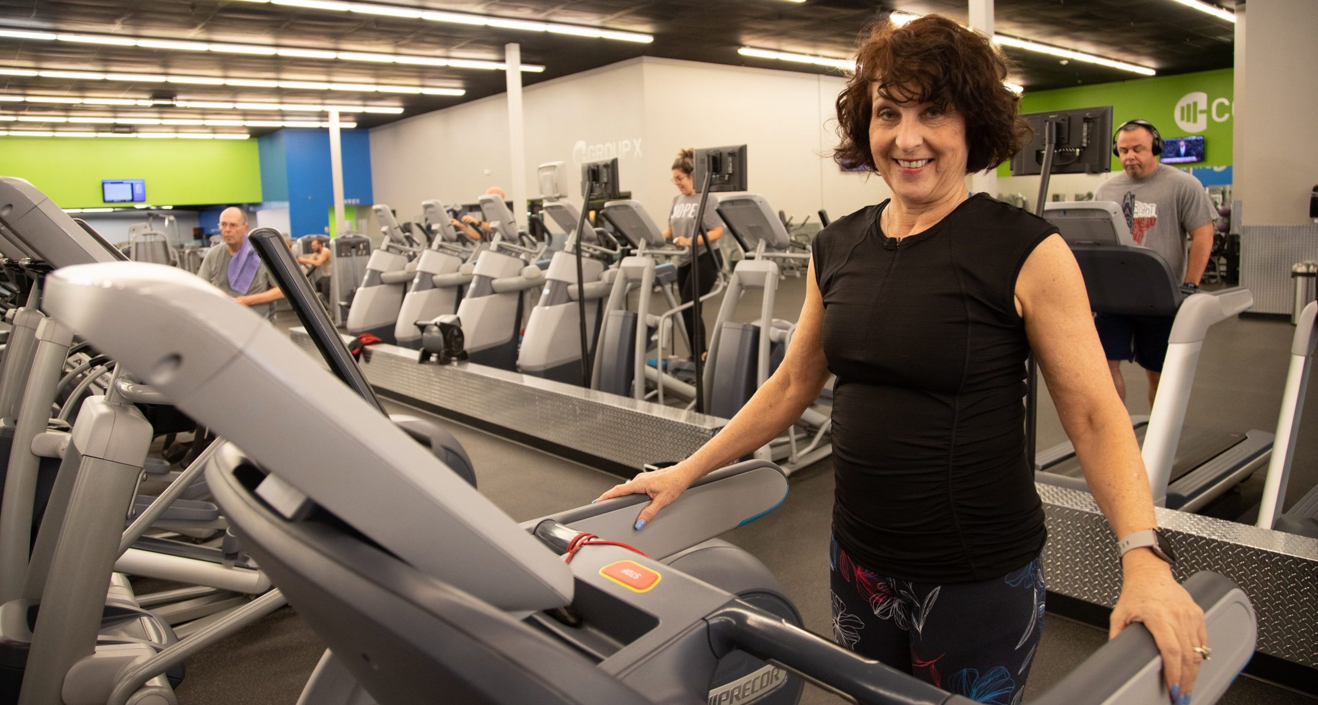 woman doing cardio at an oklahoma gym