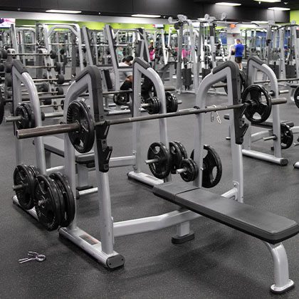 Gym with weights and other amenities